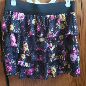 Joe benbasset mini skirt that has floral print of pink and yellow with polkadots